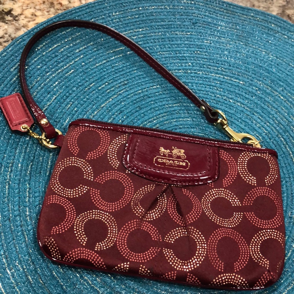 Cute crimson and gold  coach wristlet